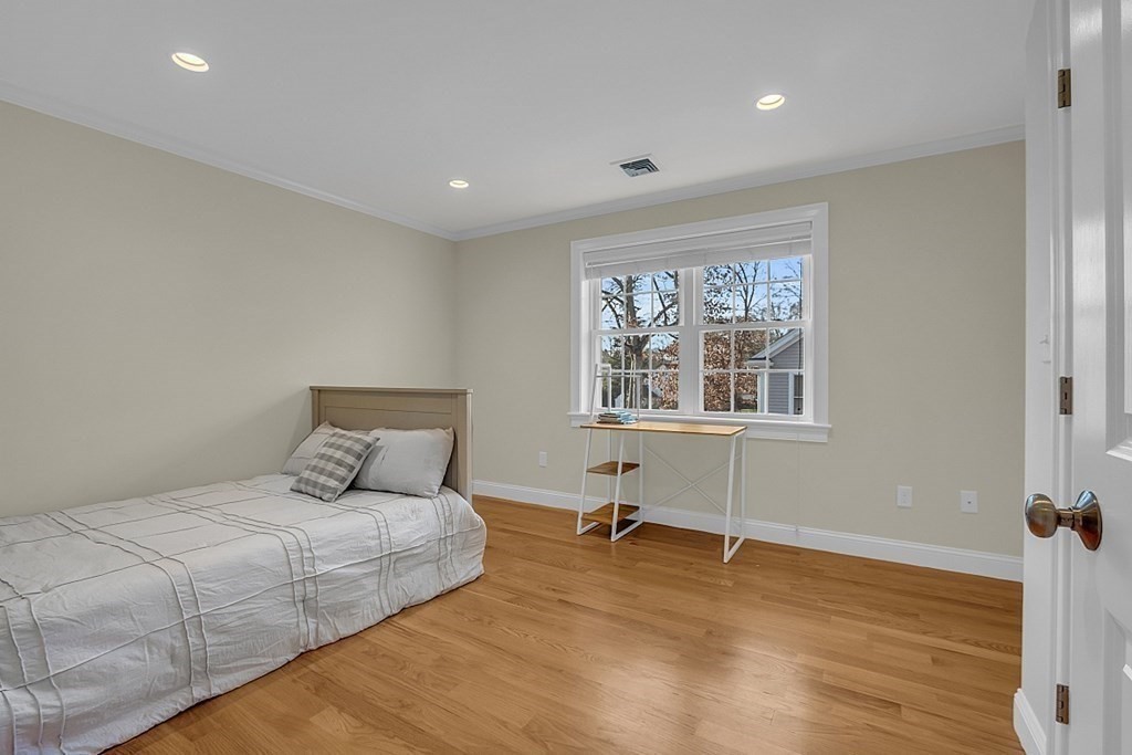 35 Pinewood Road Wellesley, MA 02482 - Photo 26 of 39 a bedroom with a bed and a window