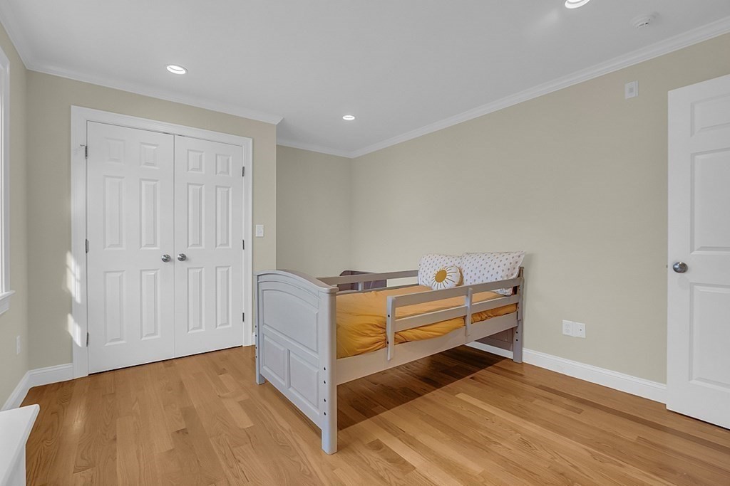 35 Pinewood Road Wellesley, MA 02482 - Photo 29 of 39 a view of room with wooden floor