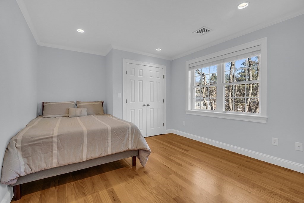 35 Pinewood Road Wellesley, MA 02482 - Photo 30 of 39 a bedroom with a bed and window