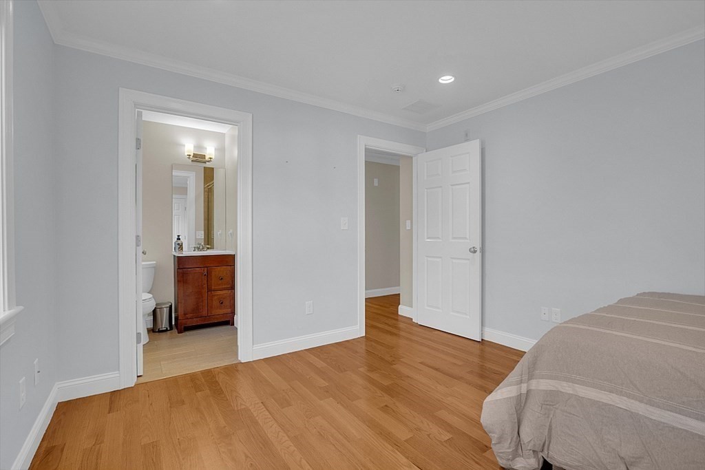 35 Pinewood Road Wellesley, MA 02482 - Photo 31 of 39 a bedroom with a bed and closet