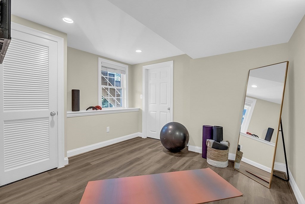 35 Pinewood Road Wellesley, MA 02482 - Photo 32 of 39 a view of a livingroom with wooden floor and furniture
