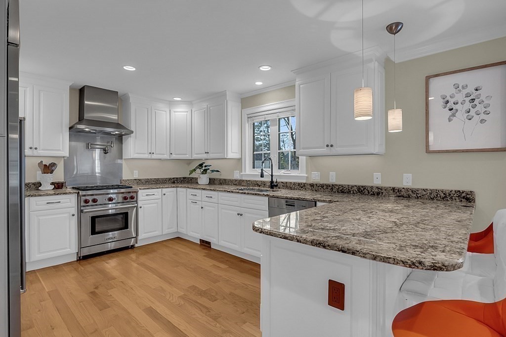 35 Pinewood Road Wellesley, MA 02482 - Photo 9 of 39 a kitchen with a stove a sink and a refrigerator