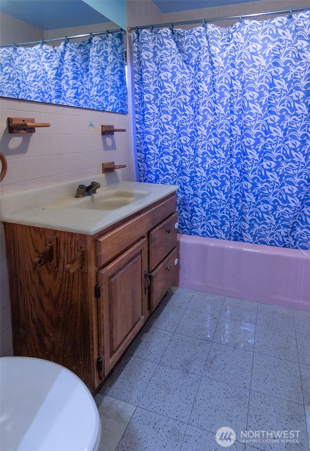 22731 Hull Road Mount Vernon, WA 98274 - Photo 11 of 26 a bathroom with a granite countertop sink and a mirror