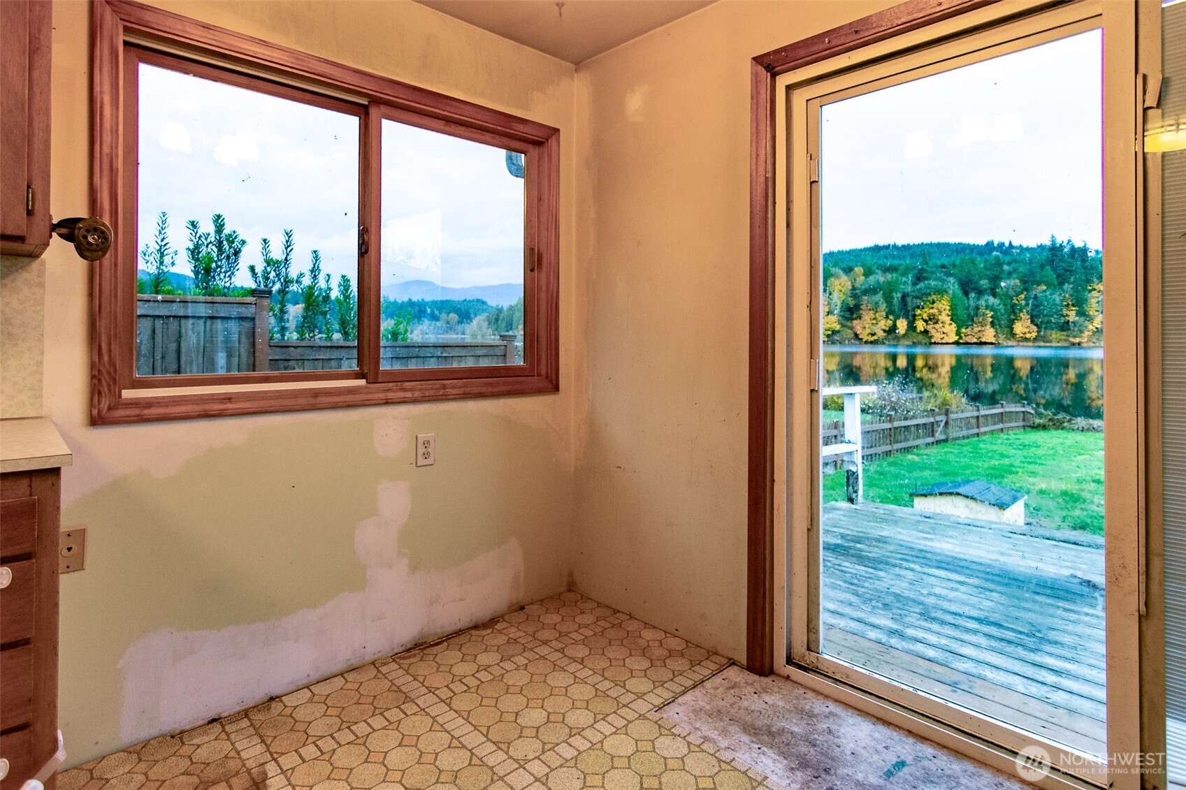 22731 Hull Road Mount Vernon, WA 98274 - Photo 8 of 26 a view of a porch with a floor to ceiling window and outside view