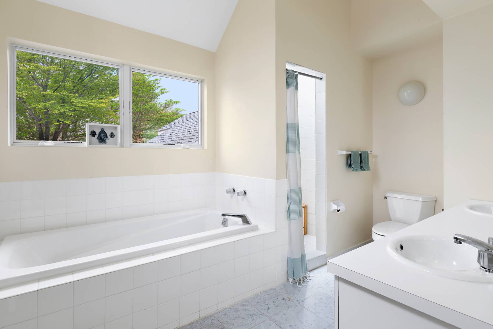 4 Fox Glove Road East Hampton, NY 11937 - Photo 14 of 15 a bathroom with a bathtub and a sink