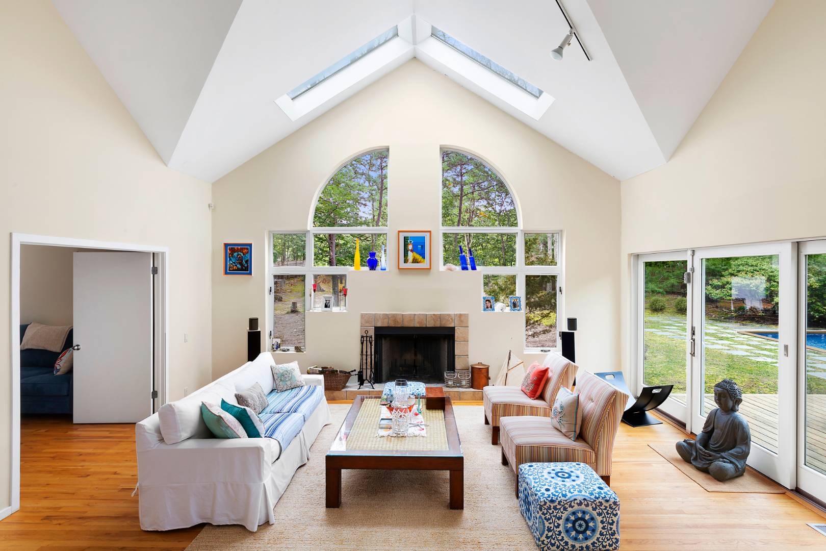 4 Fox Glove Road East Hampton, NY 11937 - Photo 6 of 15 a living room with furniture and a fireplace