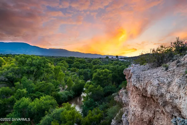 a view of a lush green mountain
