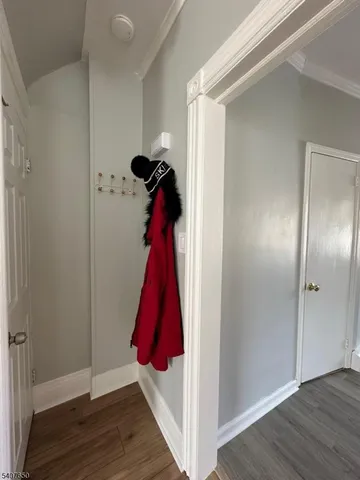 a room that has a rug and a wooden floor