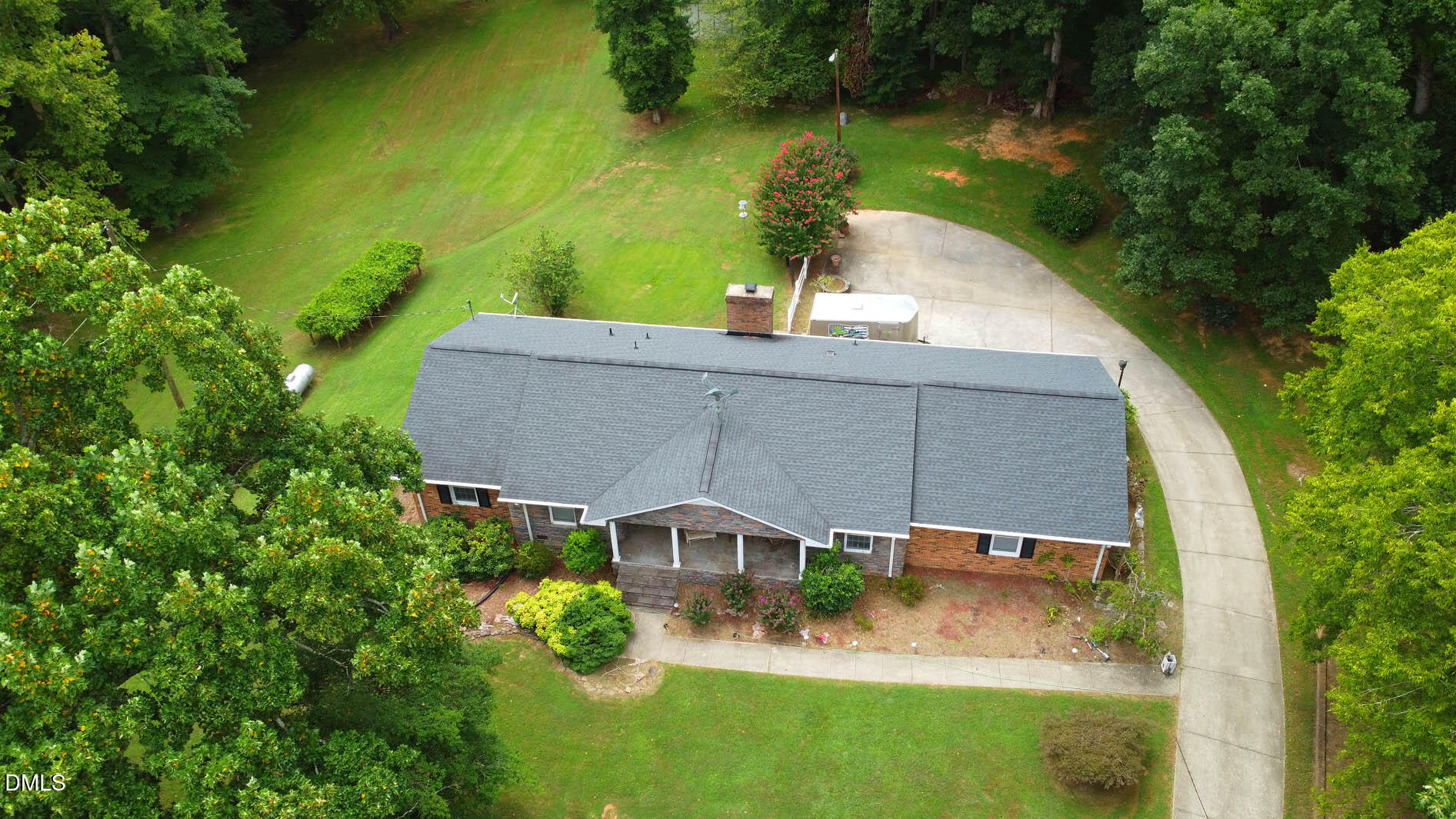 8509 Stagville Road Bahama, NC 27503 - Photo 25 of 95 an aerial view of a house with a yard basket ball court and outdoor seating