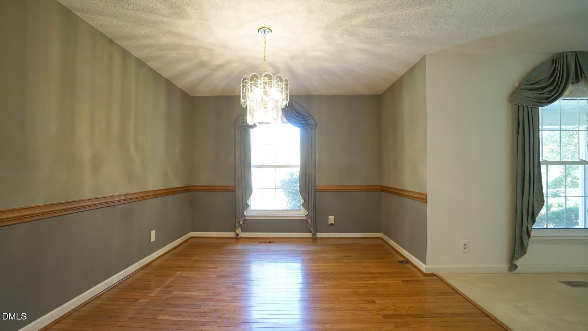8509 Stagville Road Bahama, NC 27503 - Photo 37 of 95 a view of empty room with wooden floor and fan