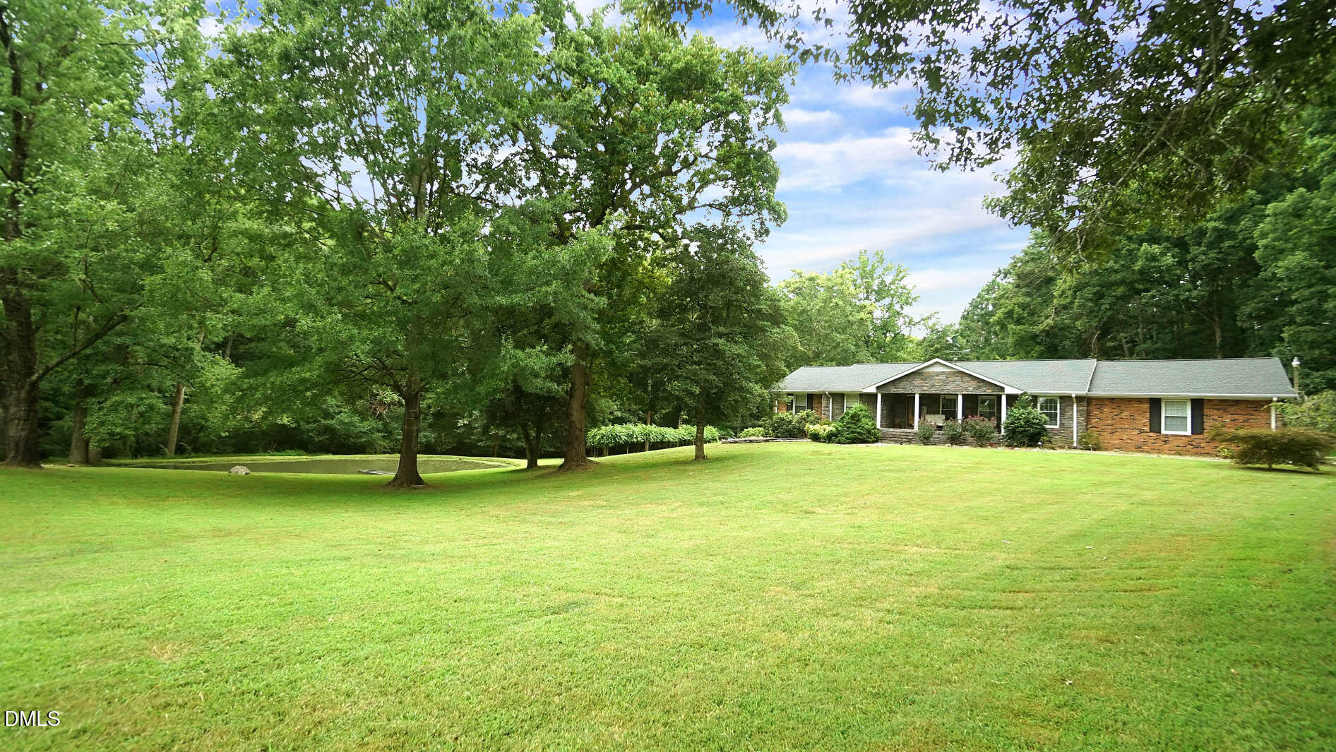 8509 Stagville Road Bahama, NC 27503 - Photo 5 of 95 a view of a house with a garden