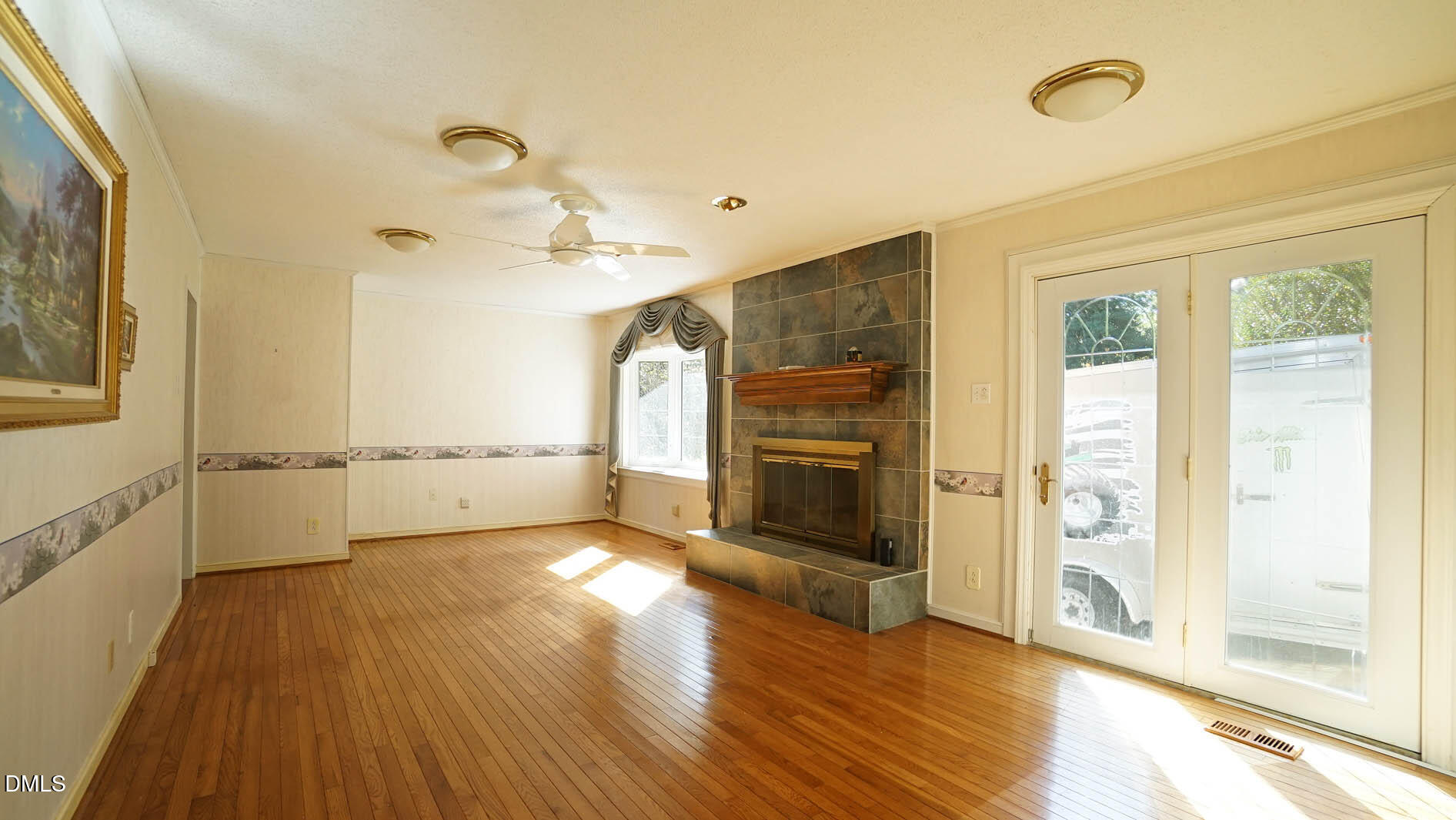 8509 Stagville Road Bahama, NC 27503 - Photo 52 of 95 a view of a kitchen with wooden floor and a ceiling fan