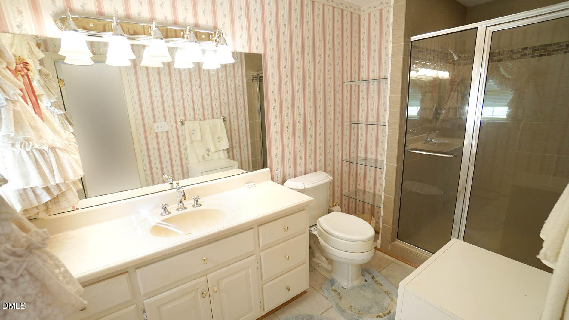 8509 Stagville Road Bahama, NC 27503 - Photo 59 of 95 a bathroom with a sink toilet and shower