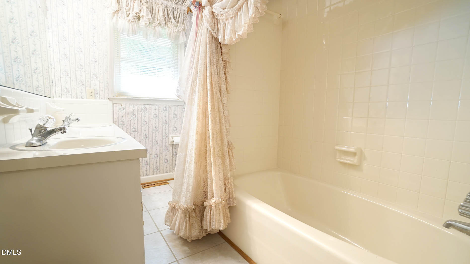 8509 Stagville Road Bahama, NC 27503 - Photo 63 of 95 a bathroom with a bathtub and a sink
