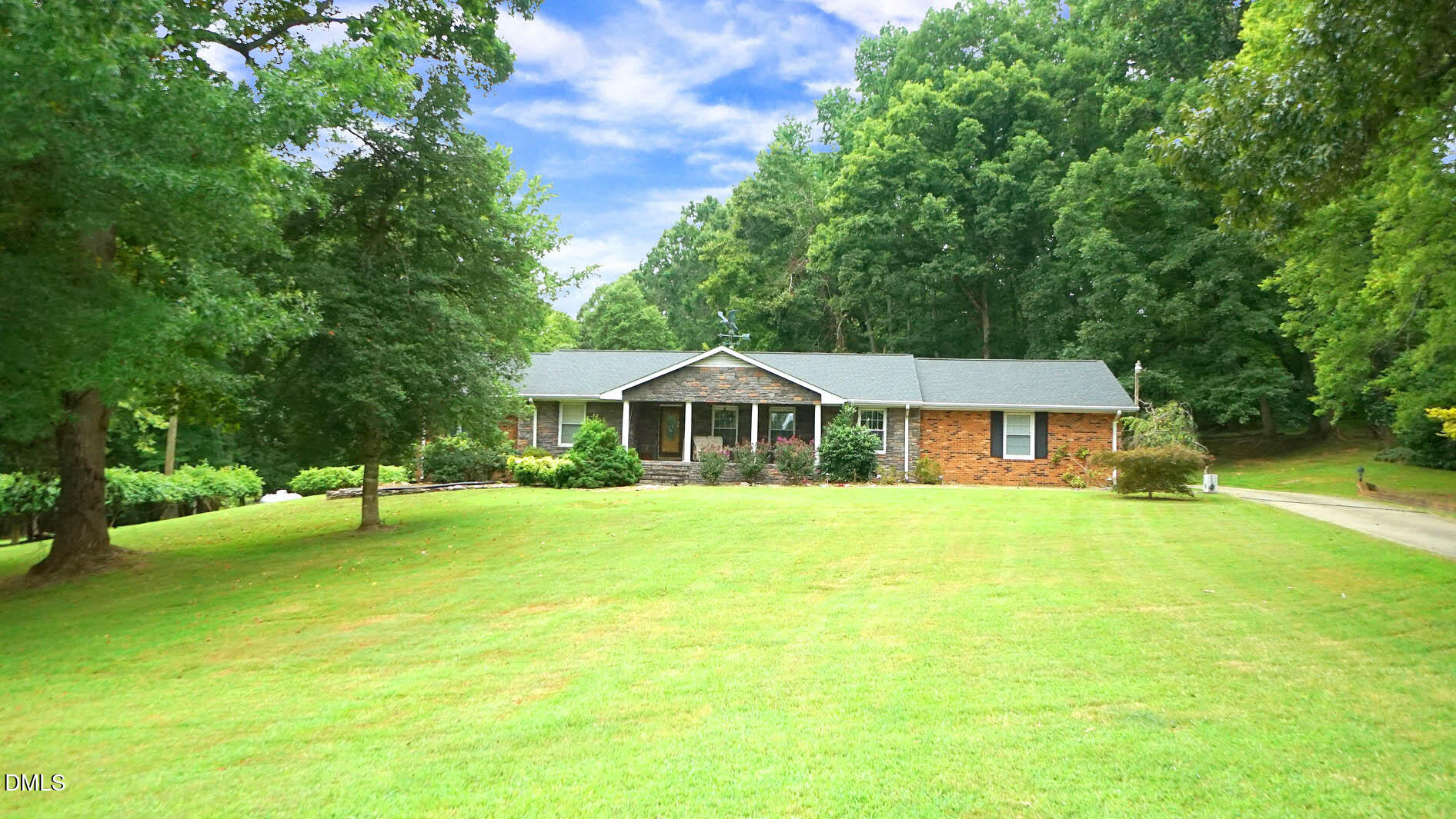 8509 Stagville Road Bahama, NC 27503 - Photo 70 of 95 a front view of a house with a garden