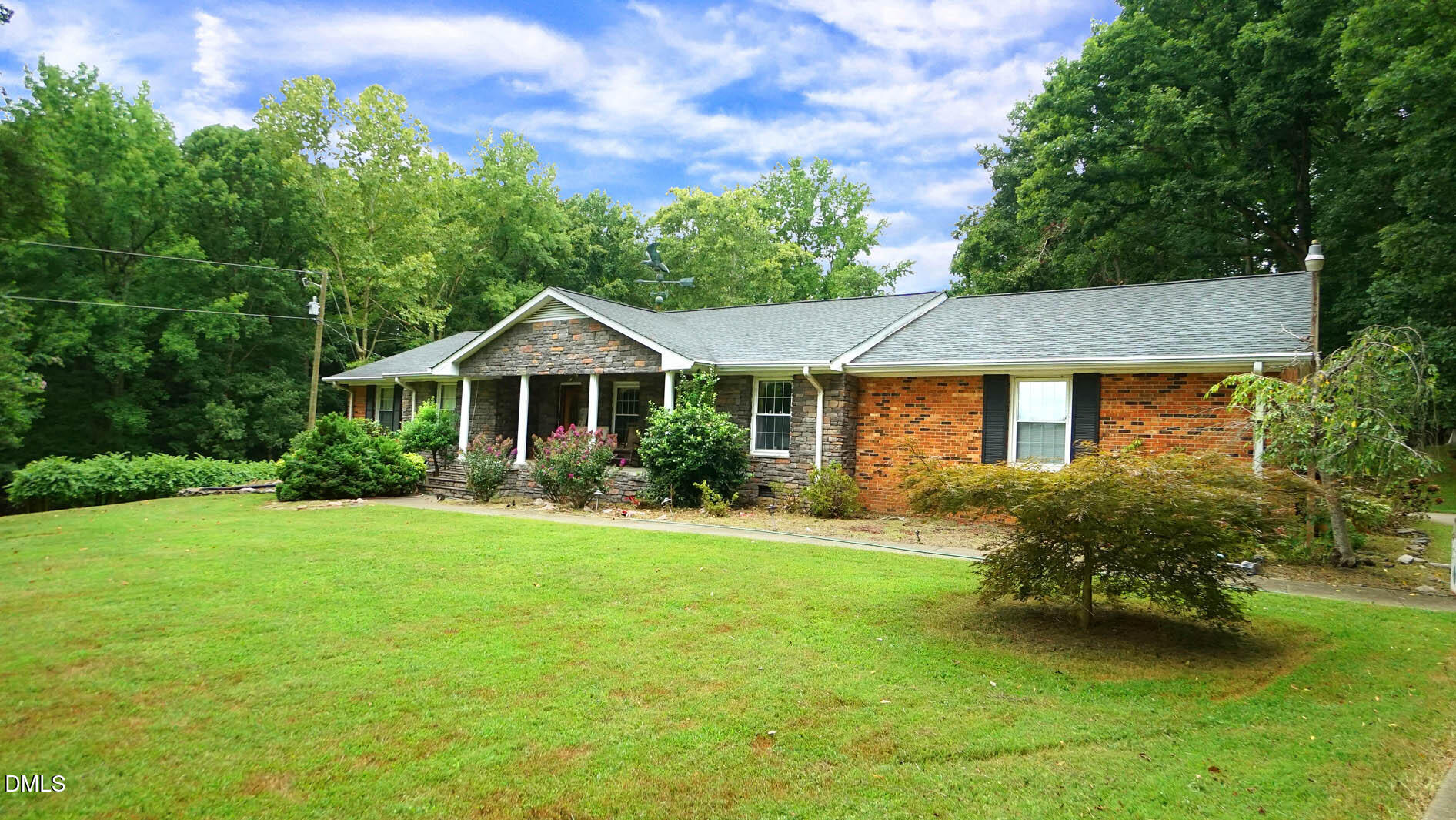 8509 Stagville Road Bahama, NC 27503 - Photo 76 of 95 a yellow and red house sitting in middle of the grass