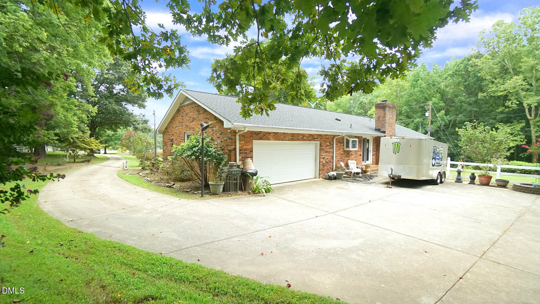 8509 Stagville Road Bahama, NC 27503 - Photo 77 of 95 a view of a house with a yard and garage