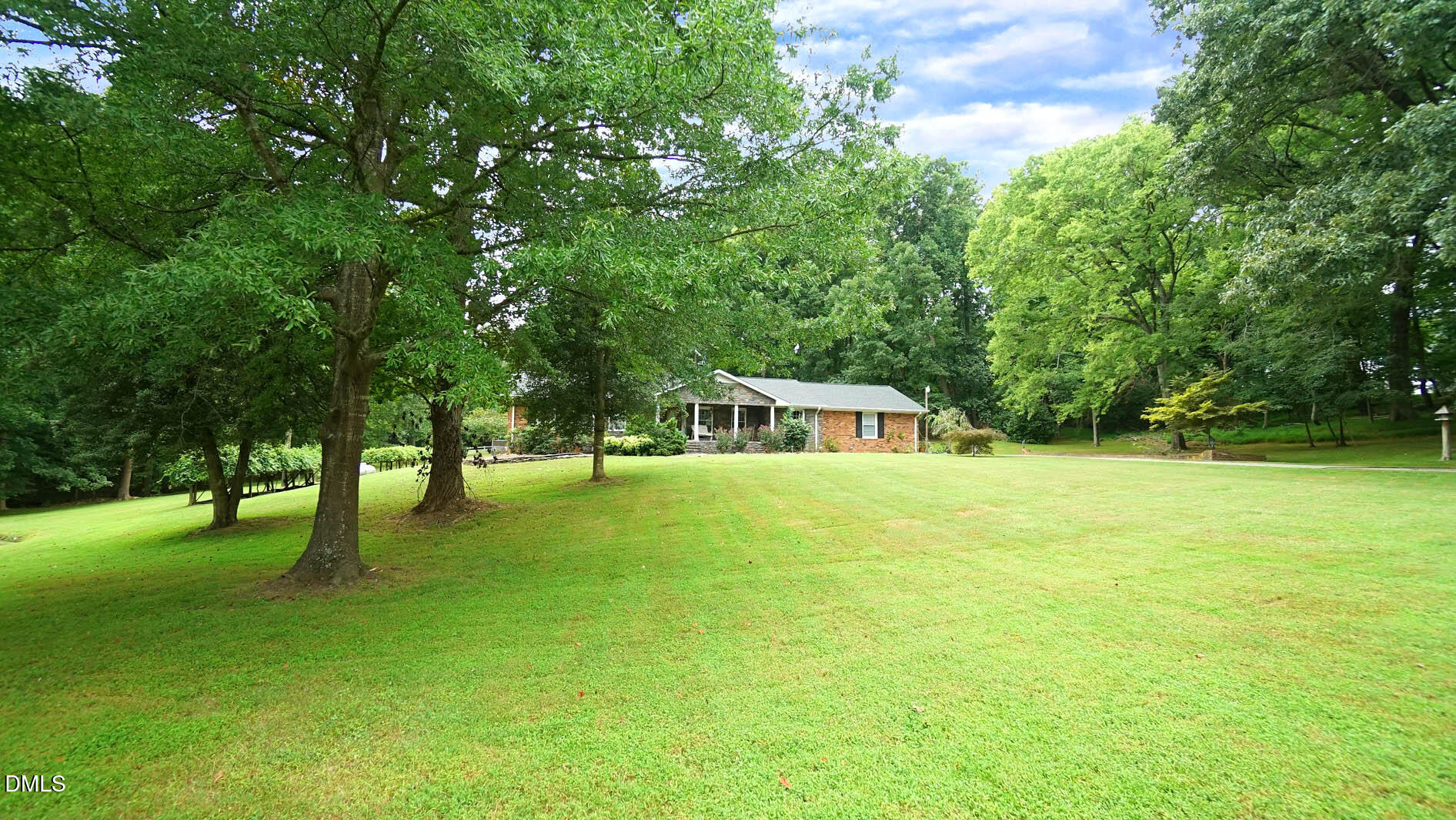 8509 Stagville Road Bahama, NC 27503 - Photo 94 of 95 a front view of a house with a yard