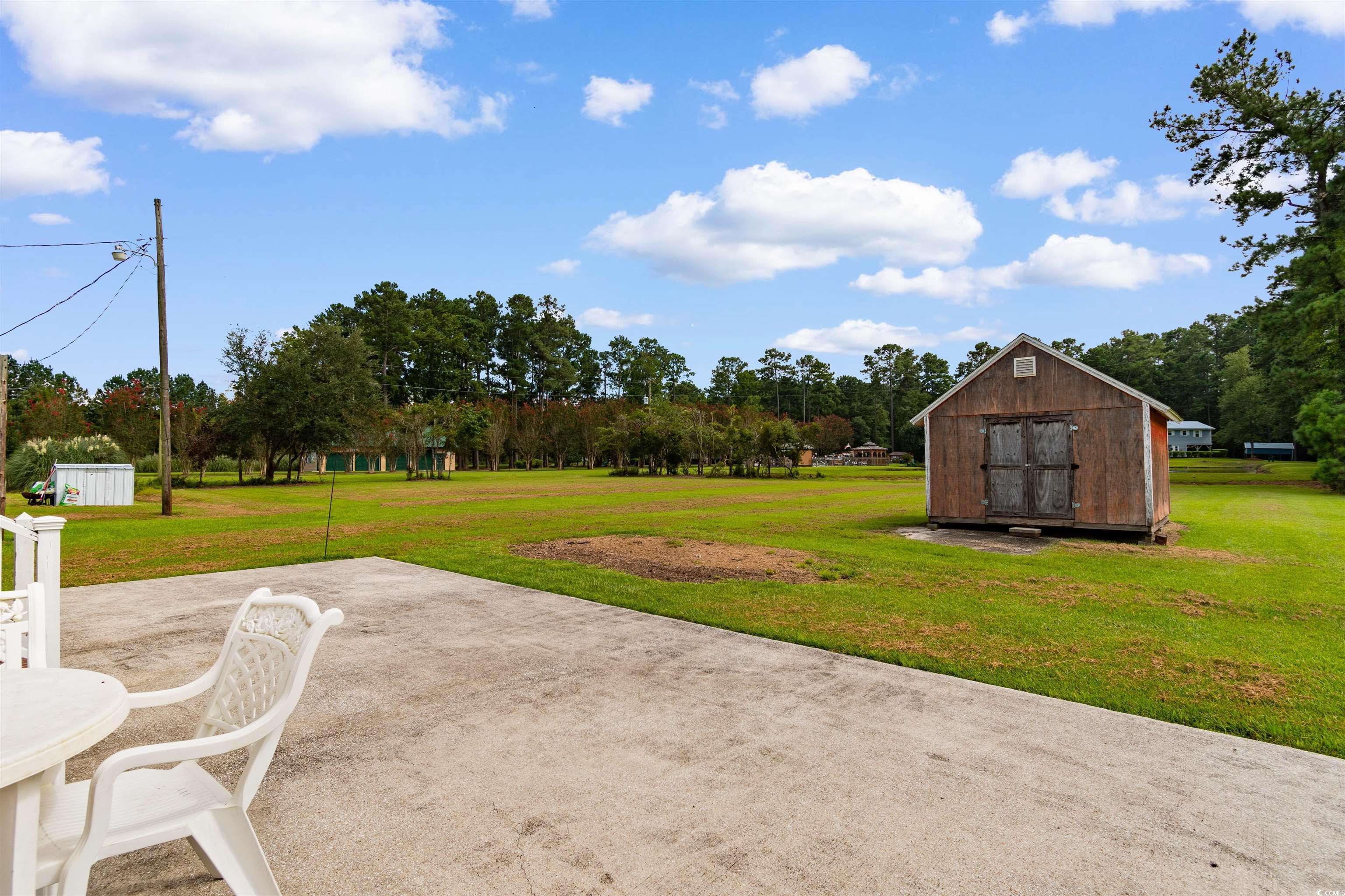 299 Williams Hill Road Hemingway, SC 29554 - Photo 31 of 40 View of patio / terrace with a shed