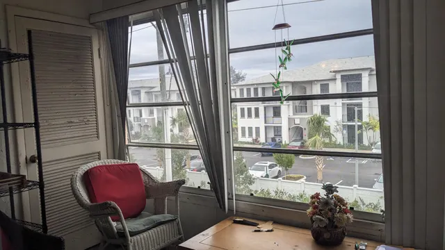 a room with furniture and a window