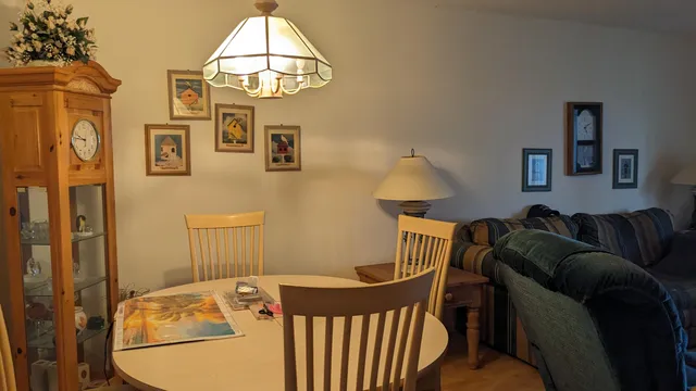 a living room with furniture and a table