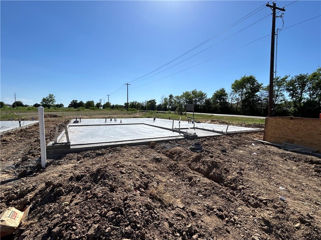 1700 Blocker Court Bryan, TX 77845 - Photo 5 of 8 a view of a yard with wooden fence