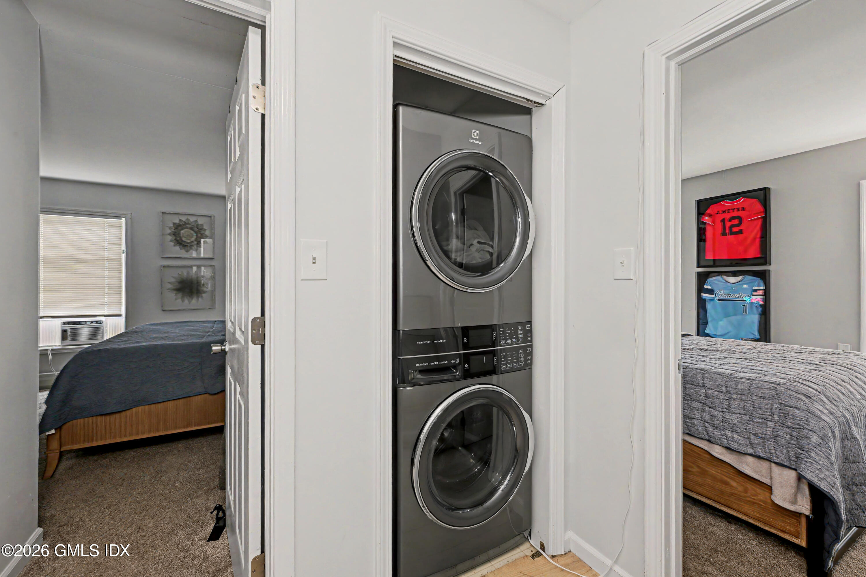 37 Prospect Street Greenwich, CT 06830 - Photo 16 of 41 a view of a bedroom with washer and dryer