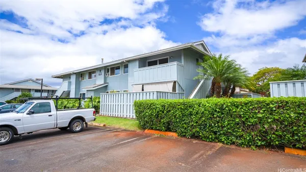 a view of a backyard with plants