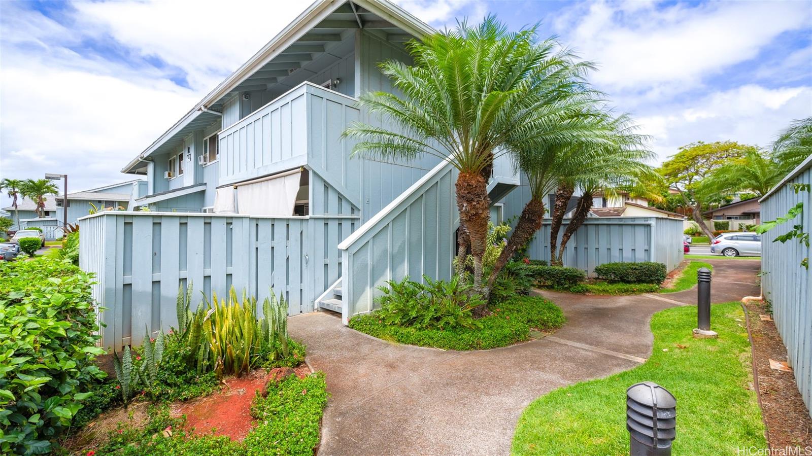 94-1036 Paha Place, Unit R8 Waipahu, HI 96797 - Photo 20 of 23 a view of a backyard with plants