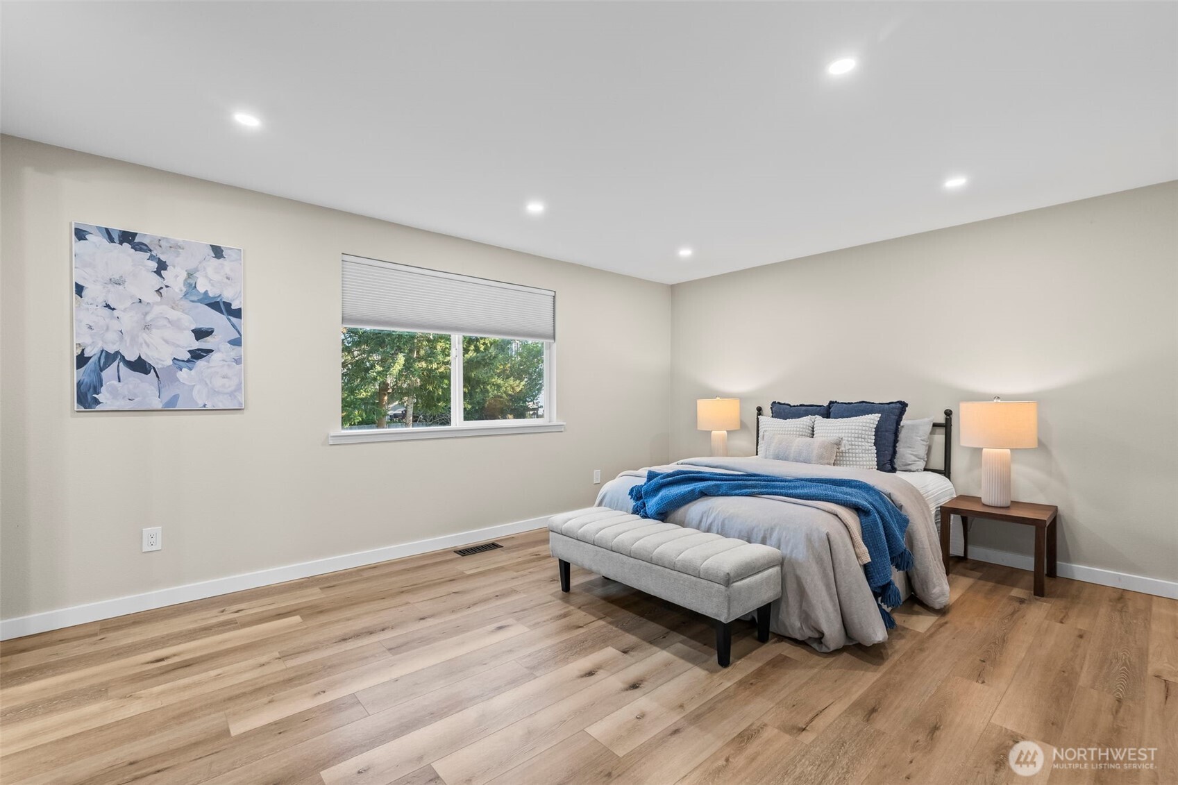 9844 Olson Road Northwest Silverdale, WA 98383 - Photo 18 of 38 a spacious bedroom with a bed and a window