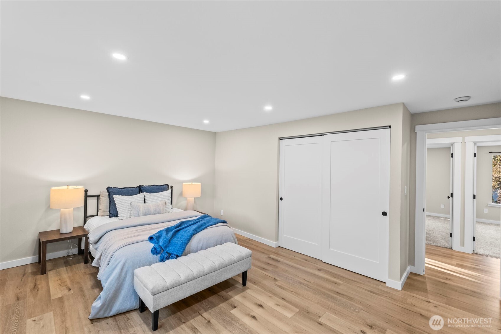 9844 Olson Road Northwest Silverdale, WA 98383 - Photo 19 of 38 a bed room with a bed and a couch