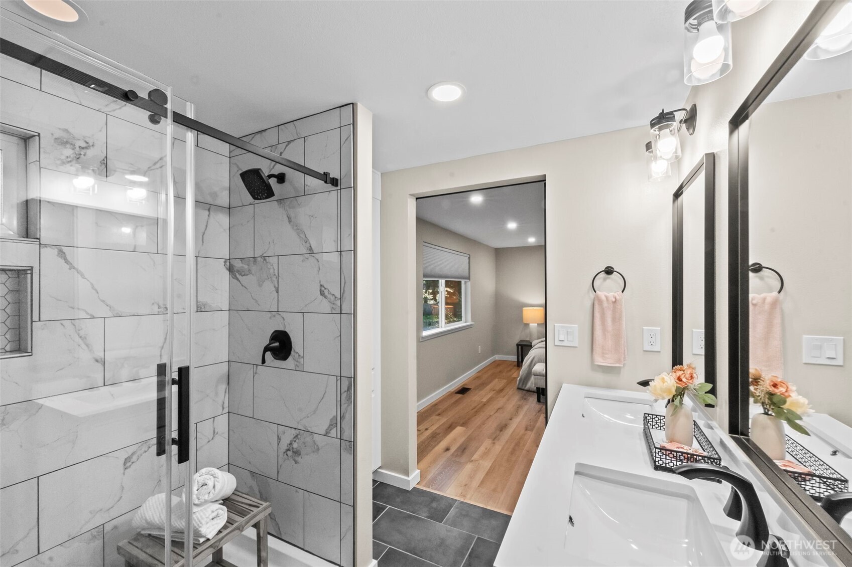 9844 Olson Road Northwest Silverdale, WA 98383 - Photo 20 of 38 a bathroom with a sink a toilet and shower