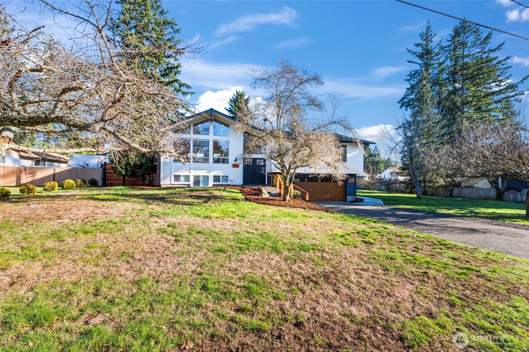 9844 Olson Road Northwest Silverdale, WA 98383 - Photo 2 of 38 a swimming pool view with a outdoor seating