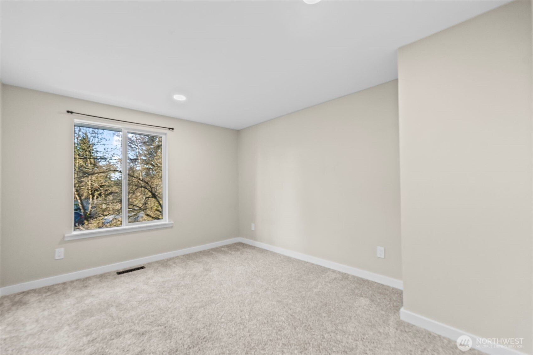 9844 Olson Road Northwest Silverdale, WA 98383 - Photo 24 of 38 an empty room with a window