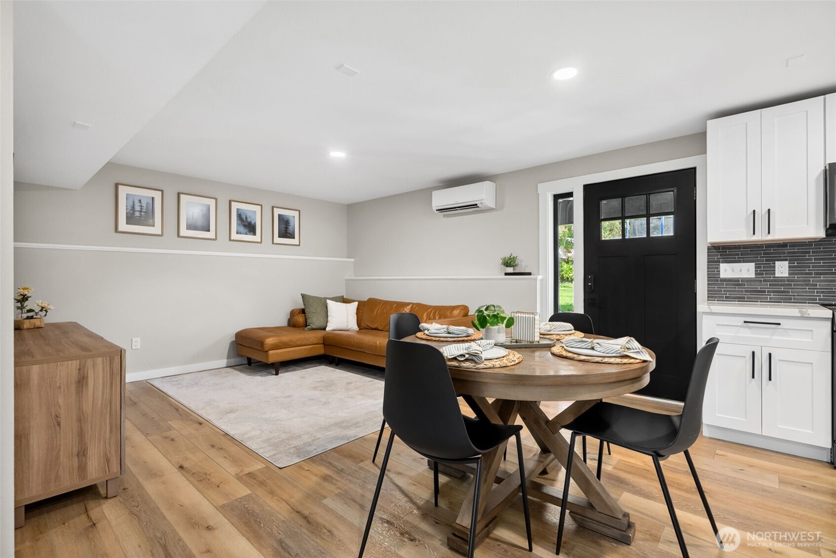 9844 Olson Road Northwest Silverdale, WA 98383 - Photo 27 of 38 a view of a dining room with furniture and wooden floor