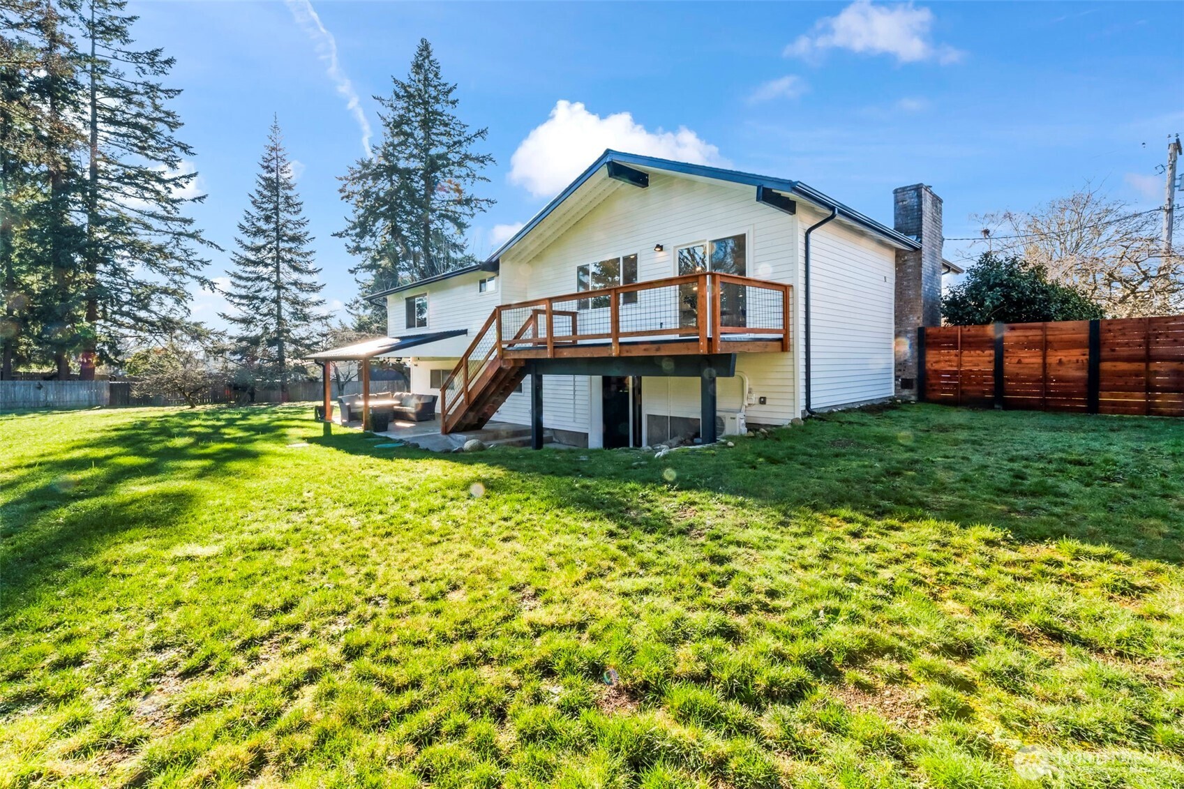 9844 Olson Road Northwest Silverdale, WA 98383 - Photo 34 of 38 a front view of a house with garden