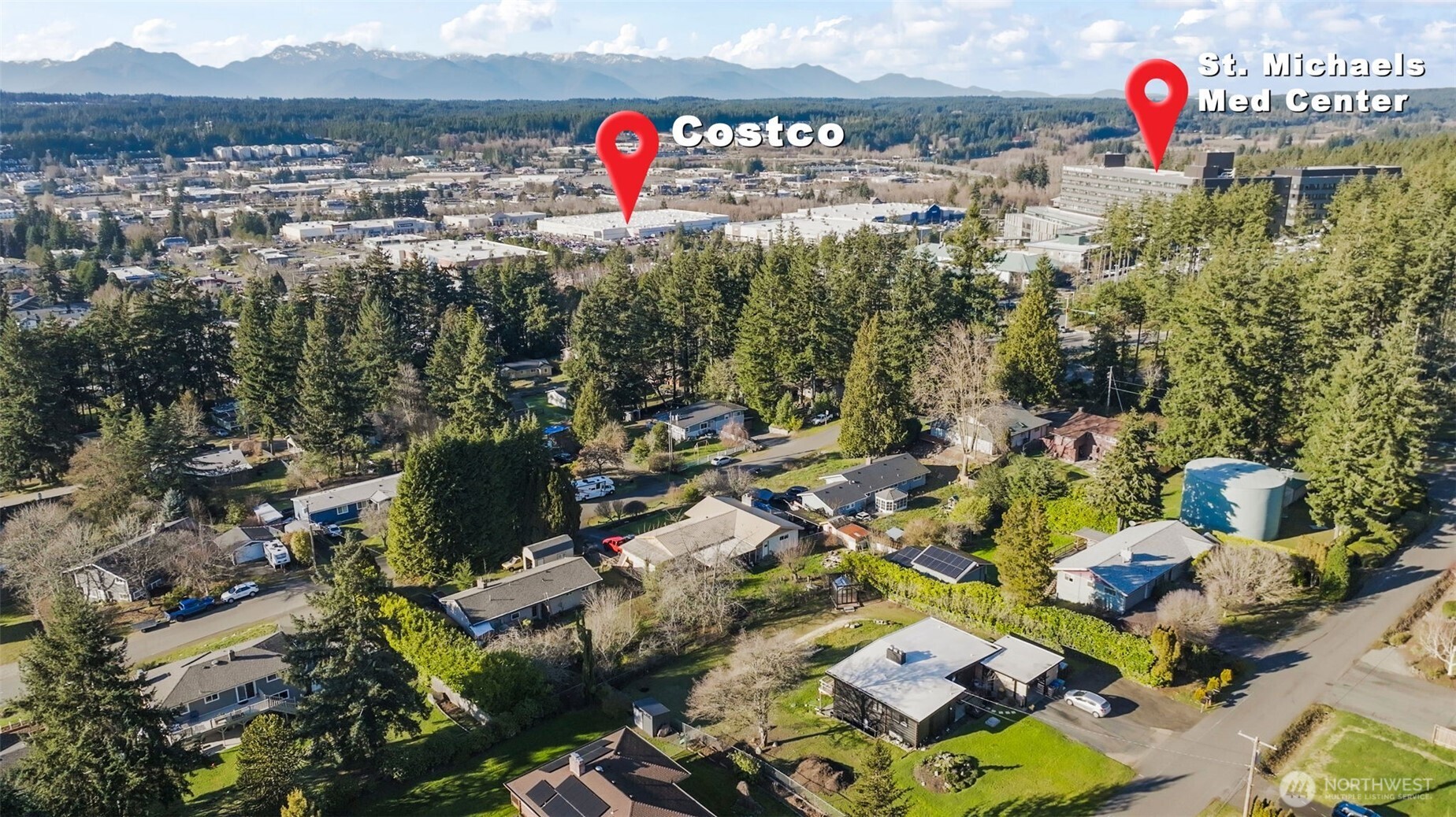 9844 Olson Road Northwest Silverdale, WA 98383 - Photo 38 of 38 an aerial view of a houses with street