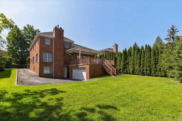 a view of swimming pool with a yard