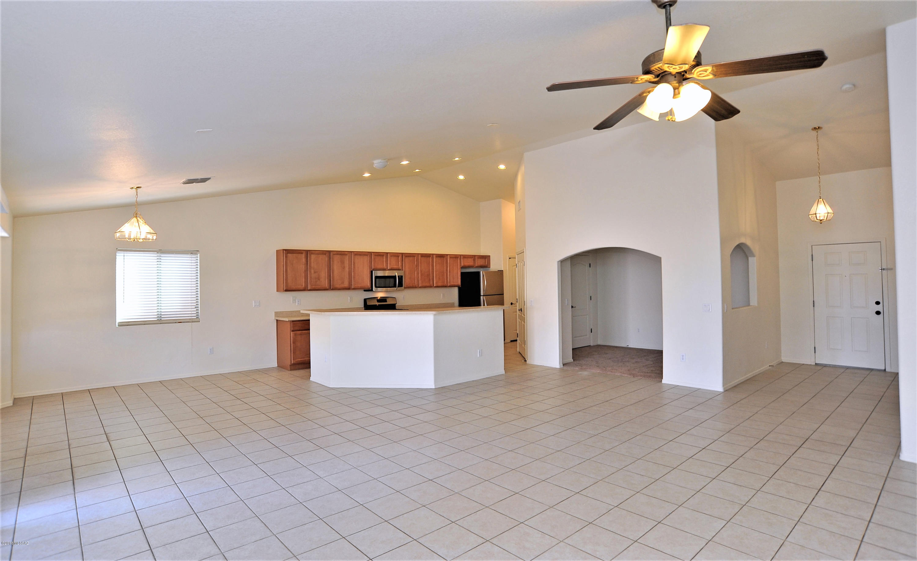558 West Chatfield Street Vail, AZ 85641 - Photo 7 of 31 a view of kitchen and with a chandelier fan