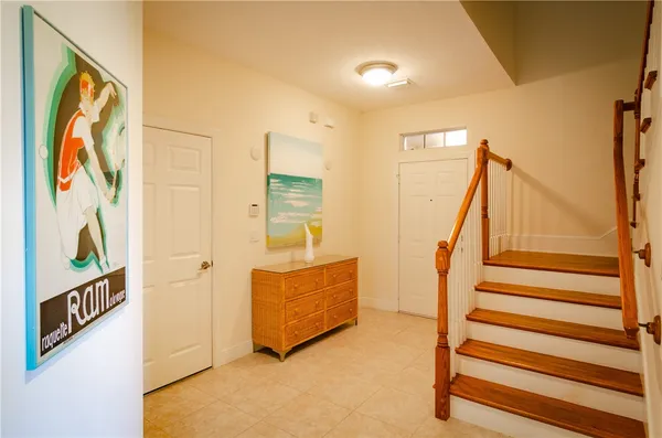 a view of front door with stairs