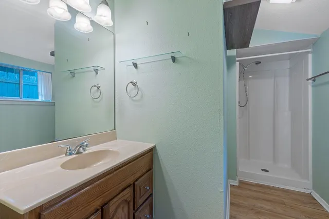 a bathroom with a sink and a mirror