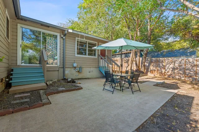 a table and chairs in the patio