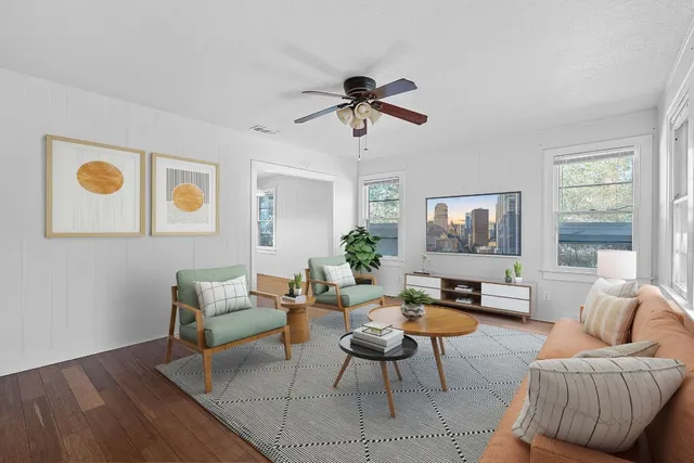 a living room with furniture and a window