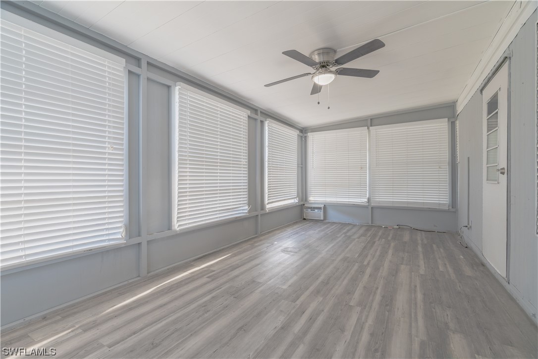 153 Cape Sable Drive Naples, FL 34104 - Photo 28 of 35 a view of an empty room with a window