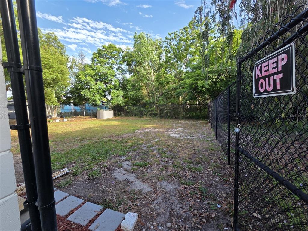 7216 James Street Port Richey, FL 34668 - Photo 23 of 28 a view of a yard with plants