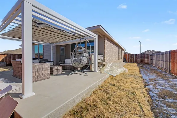 a view of a house with a patio