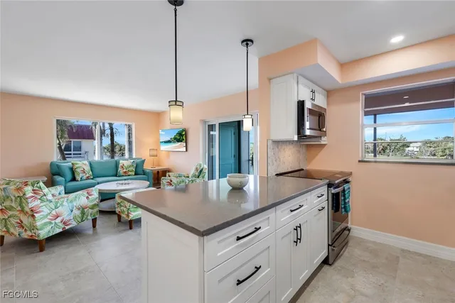 a kitchen with a stove and a microwave