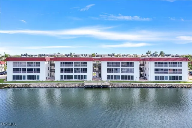 a view of a balcony with chairs