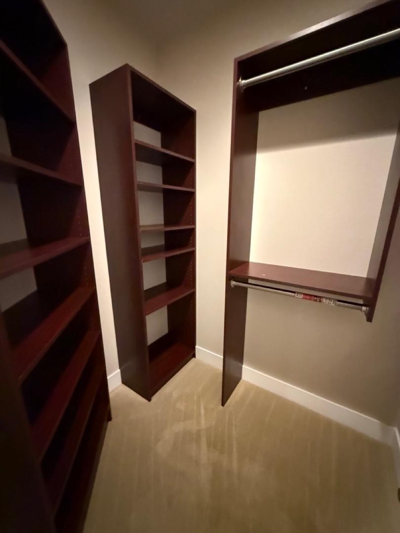 94 Harold Avenue Santa Clara, CA 95050 - Photo 21 of 34 a view of walk in closet with empty racks