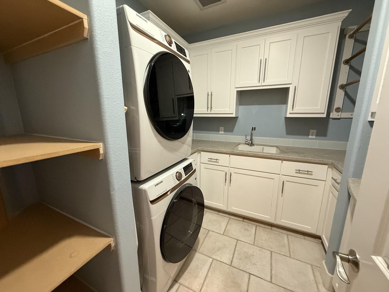 94 Harold Avenue Santa Clara, CA 95050 - Photo 22 of 34 a utility room with dryer and washer
